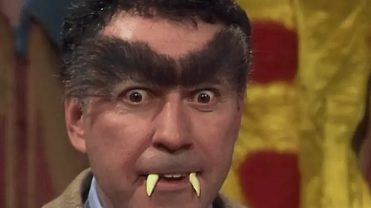 Alan Arkin gives a menacing face in his "Hyde" form with bushy eyebrows and Muppet fangs, from the TV show, "The Muppet Show."