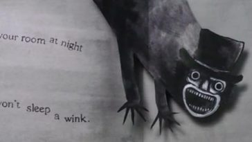 A page from "The Babadook" pop up book. The Babadook lunges from the ceiling with the words "See him in your room at night you won't sleep a wink."