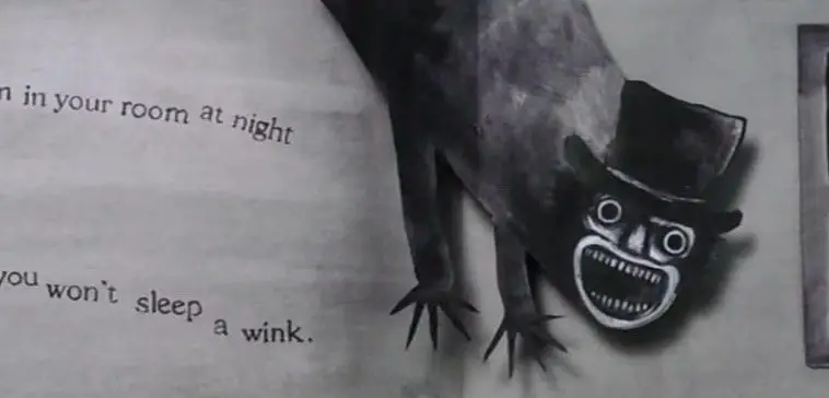 A page from "The Babadook" pop up book. The Babadook lunges from the ceiling with the words "See him in your room at night you won't sleep a wink."