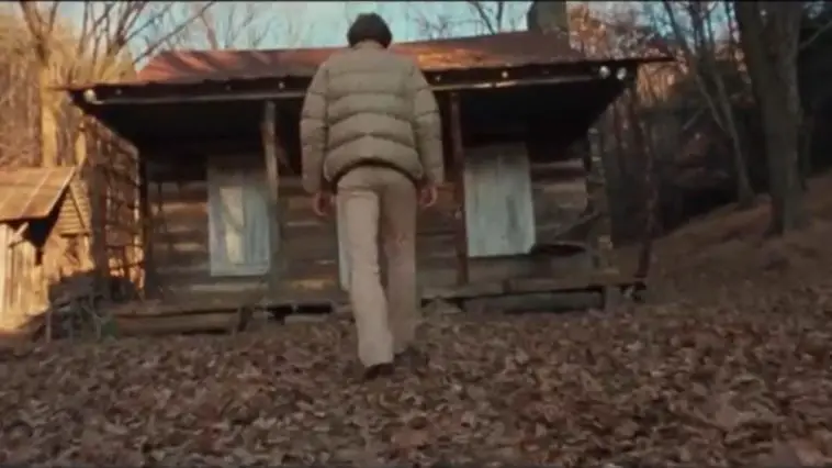 A man approaches the cabin at the beginning of "The Evil Dead."