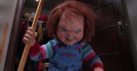 Chucky smiles while wielding a school ruler