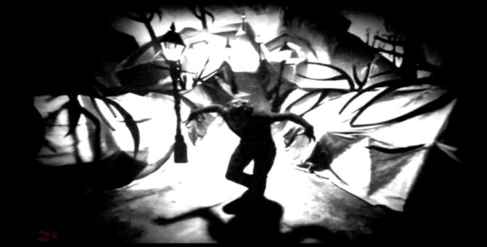 Image from a music video in "Queen of the Damned," featuring heavy influence of "Dr. Caligari" sets. 