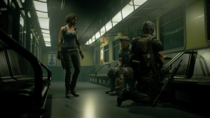 In an otherwise empty subway train car, Jill Valentine speaks to Umbrella mercenary Mikhail Viktor while fellow mercenary Carlos Oliveira tends to Mikhail's wounds. 