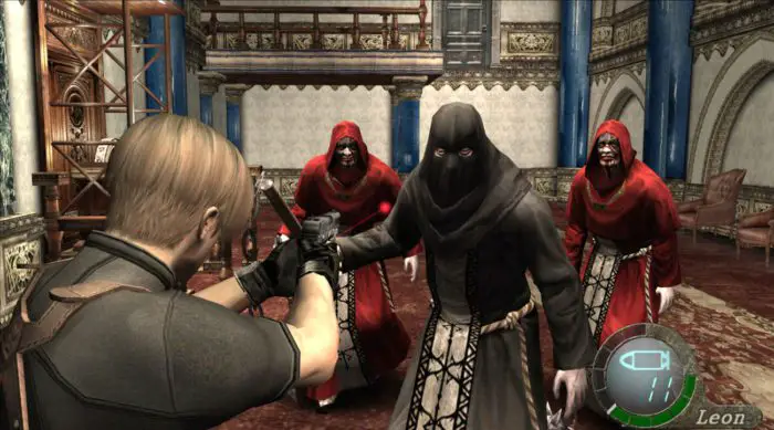 Leon Kennedy points his gun at three robed Ganados that are approaching him in a castle.
