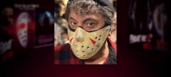 Tom Savini wears a face mask in the shape of Jason Voorhees' hockey mask in the series, "Behind the Monsters."