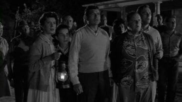 A crowd of people at night