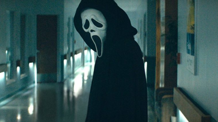 Ghostface looks back at Dewey moments after...something terrible happens in the hospital