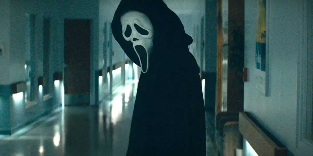 Ghostface looks back at Dewey moments after...something terrible happens in the hospital