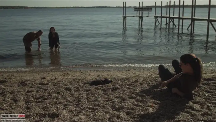 Isa (Aleksa Palladino) and Josh (Ross Partridge) swim, before trying to goad Annie (Jennifer Lafleur) into joining them