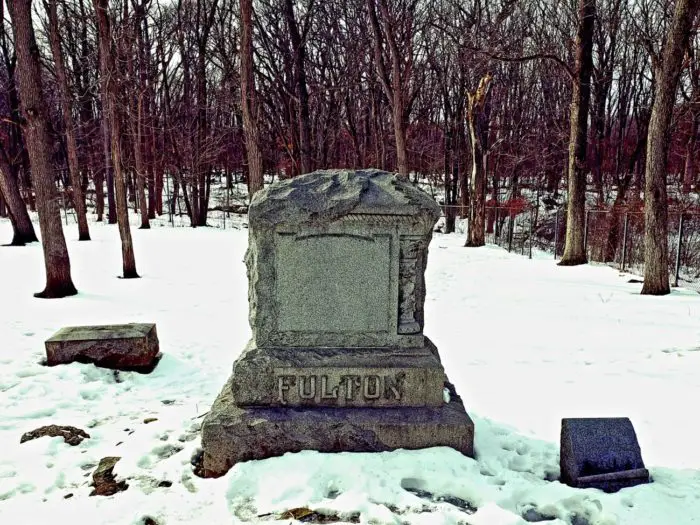 Large tombstone in Bachelor's Grove with the name Fulton inscribed.
