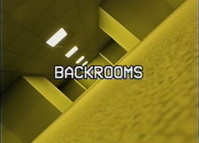 Noclipping into the Backrooms, we see the title and the yellow wallpaper.
