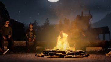 Counselors gather around a campfire in The Quarry