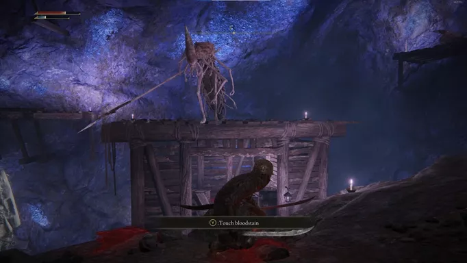 a large prawn-like humanoid approaches a warrior in a cave lined with crystals