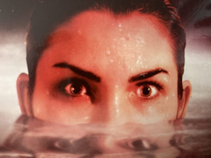 Close up of a woman emerging from water