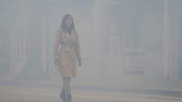 Marie walking in the fog