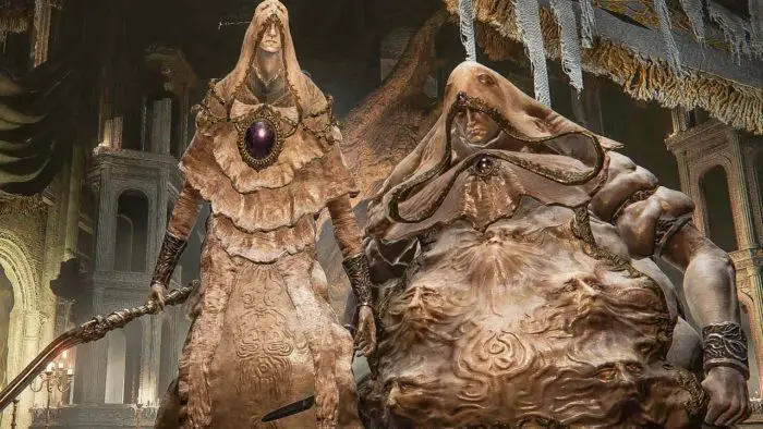 two humanoids wearing cloth made of skin stand menacingly