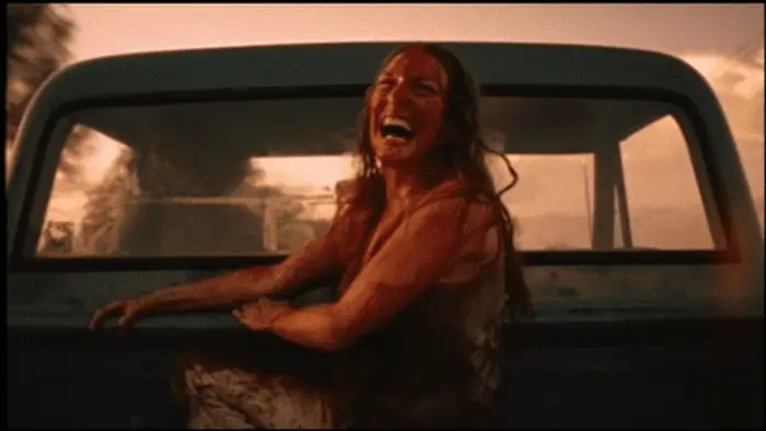 Sally Hardesty revels in her escape from the cannibal family in The Texas Chain Saw Massacre (1974).