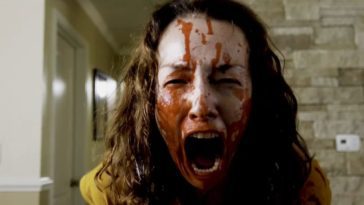A blood-soaked woman screaming