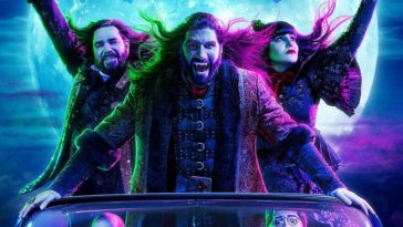 (L to R) Laszlo, Nandor, and Nadja are standing up in a convertible with the moon behind them in a poster for What We Do in the Shadows