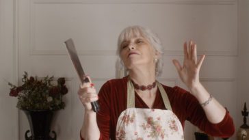 A woman waving a knife around