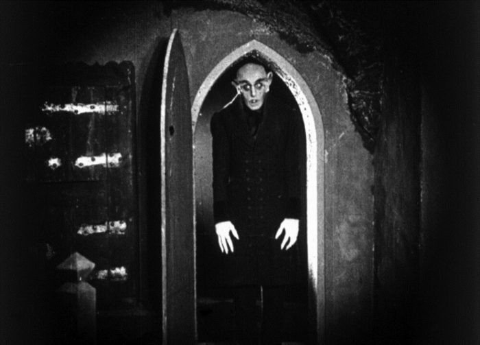 Orlok standing in a doorway