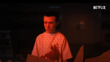 Eleven with bloody clothes and a bloody face