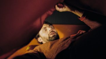 Vinicius Coelho as Eugène unable to sleep in The Eyes Below
