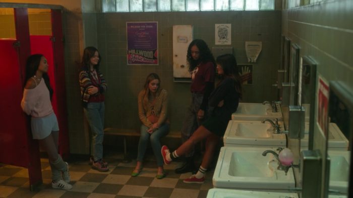 The five girls sit in the bathroom after Imogen is told she is going to be Spirit Queen