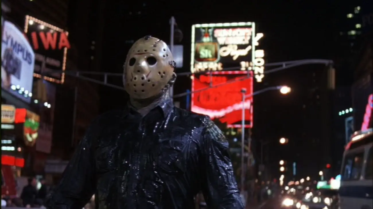 Jason walks the neon-lit streets of Manhattan