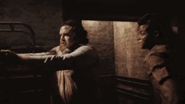 Baxter and Jade stand together as Baxter aims his gun at something offscreen in the Resident Evil series