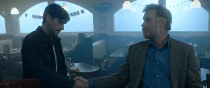 Bishop and Sawyer shake hands at a diner in The Retaliators