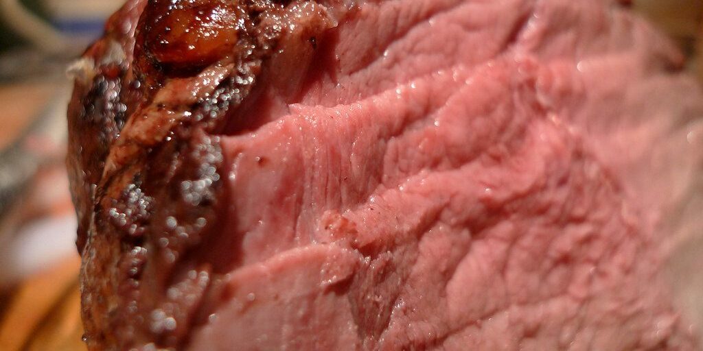 A close-up image of cooked meat