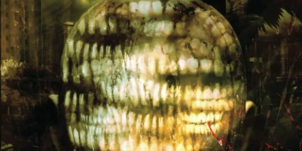 An image of a face made up of many sets of teeth.