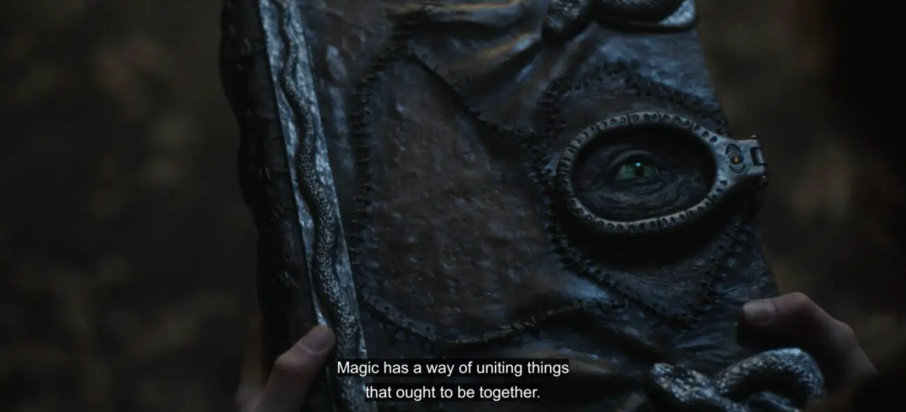 The magic book looks up as Mother Witch says, "Magic has a way of uniting things that ought to be together," in the film, "Hocus Pocus 2" (2022).