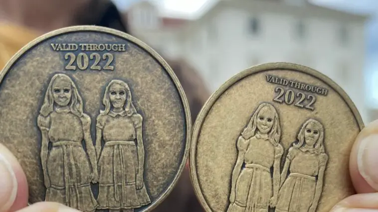 Stanley Hotel parking coins, depicting twins from The Shining