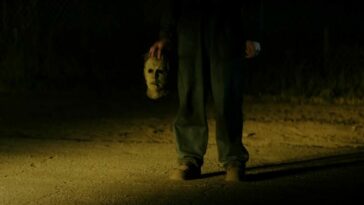 Michael Myers holding his mask