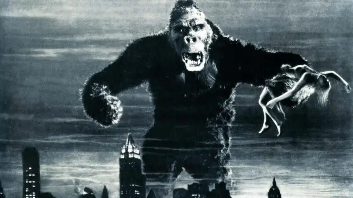 Promotional poster for 1933s King kong, shows the monster monkey on top of the Empire State building with Fay Wray in his hand.