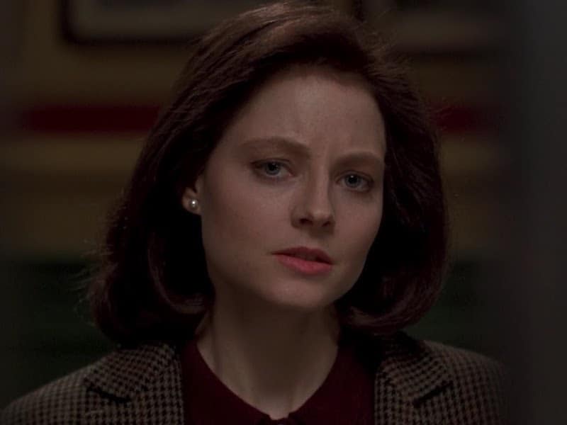 Clarice Starling from the movie Silence of the Lambs, looking pensive about her position in the Buffalo Bill case in her first face-to-face interview with the incarcerated psychiatriast and psychopath, Hannibal Lecter
