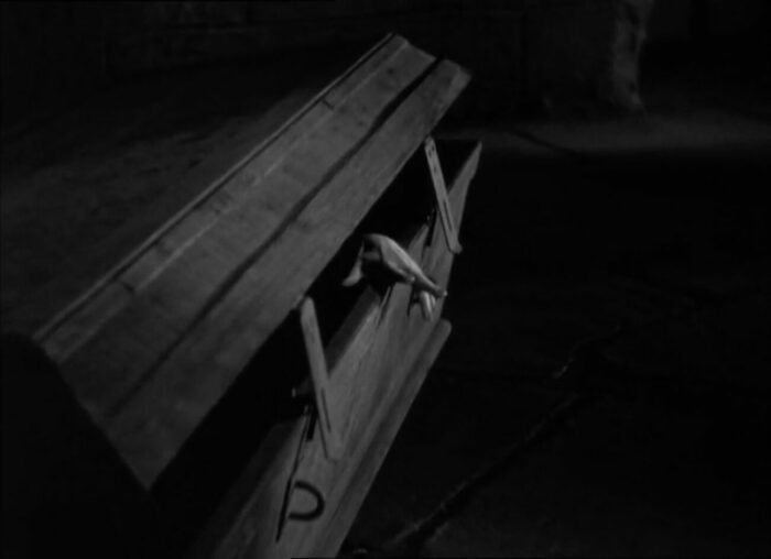 Countess Marya Zaleska (Gloria Holden) reaches a hand out of her coffin, in the film, "Dracula's Daughter" (1936).