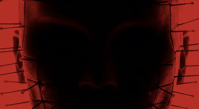 A silhouette of Pinhead against a deep red background
