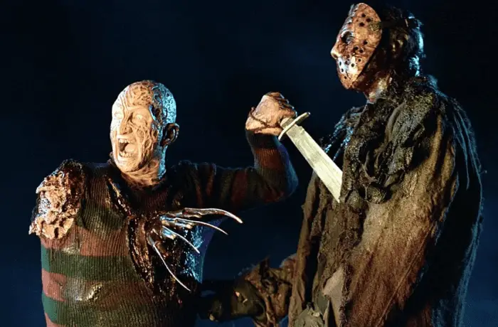 Freddy attacking Jason with a machete