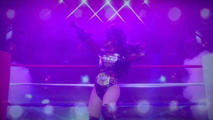Melissa posing in a wrestling outfit