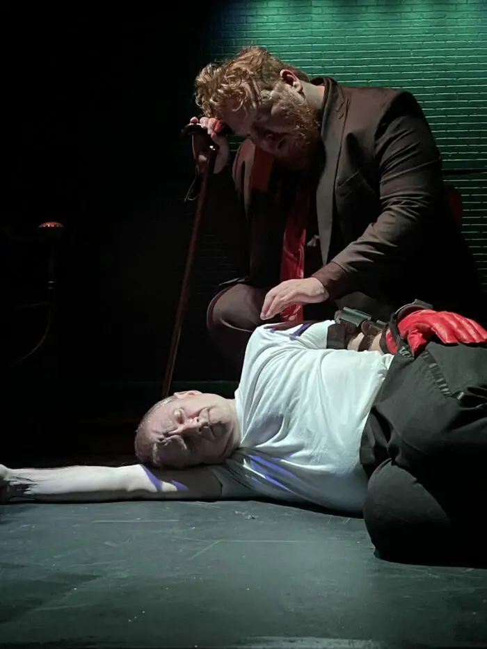 The ghost of Buckingham curses the sleeping King Richard but cannot physically touch him.