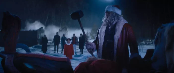 Santa holding a hammer