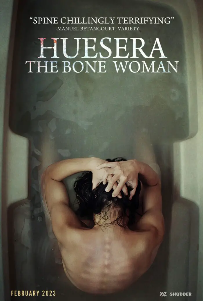 Poster for Huesera showing Valeria bending over in the bathrub with her head in her hands