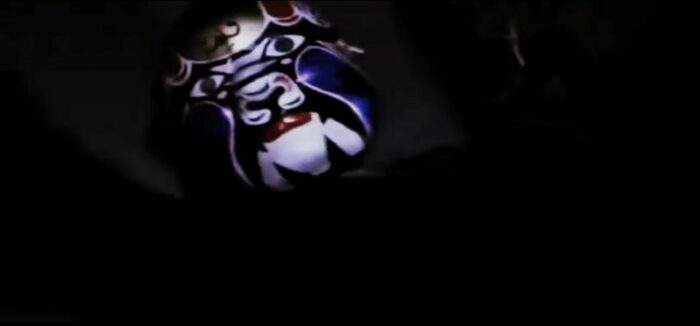 A boy in a mask
