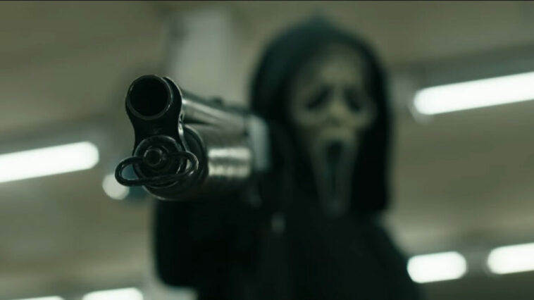 A picture of Ghostface holding a shotgun.