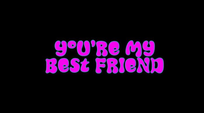 Title card for You're My Best Friend, purple text spelling "You're My Best Friend" overlayed on a black background