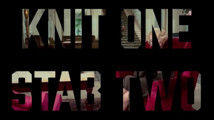 Title card for Knit One, Stab Two, text spells out "Knit One, Stab Two" with an image of someone knitting inside the text