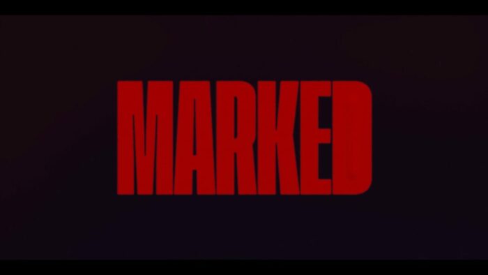 Title card for Marked, red text spells "Marked", overlayed on a black background